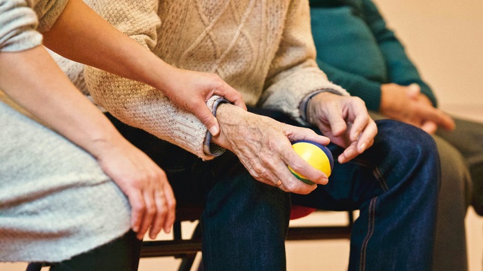 How to become a Helping Hands caregiver for a family member?